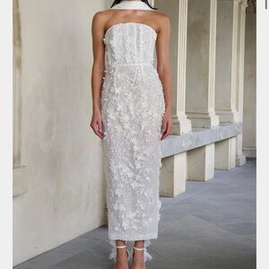 Brand new never worn still with the tags white dress